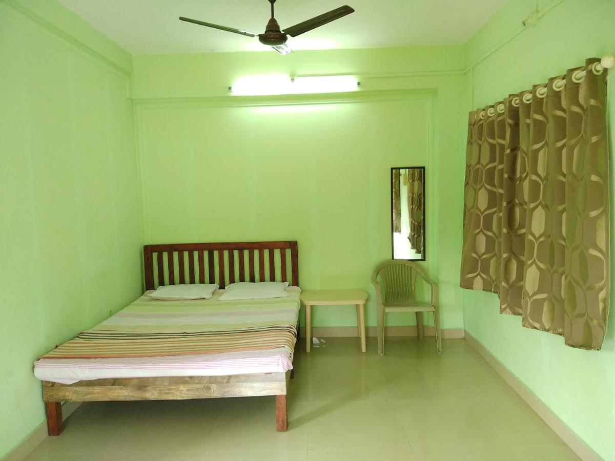 Dlite Beach Grove Cottages Alībāg Rum bild